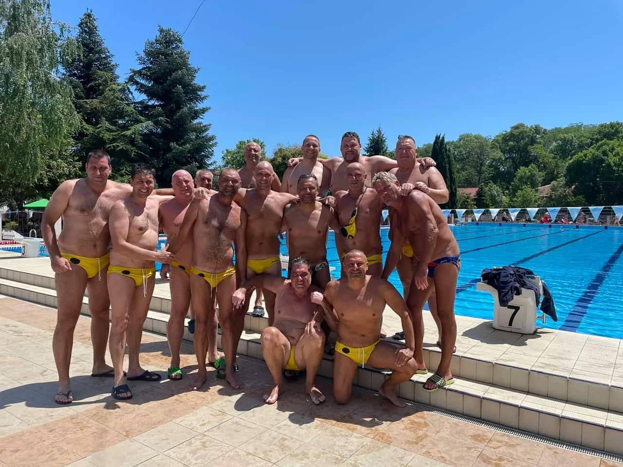The team by the outdoor pool — another frame, Kranevo