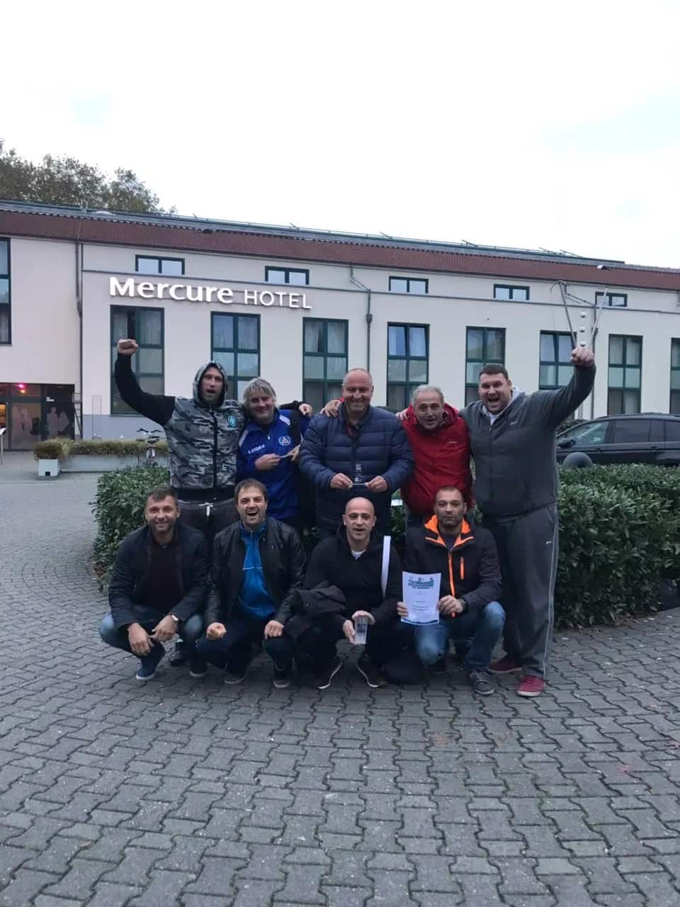 The team in front of the hotel — another frame, Krefeld