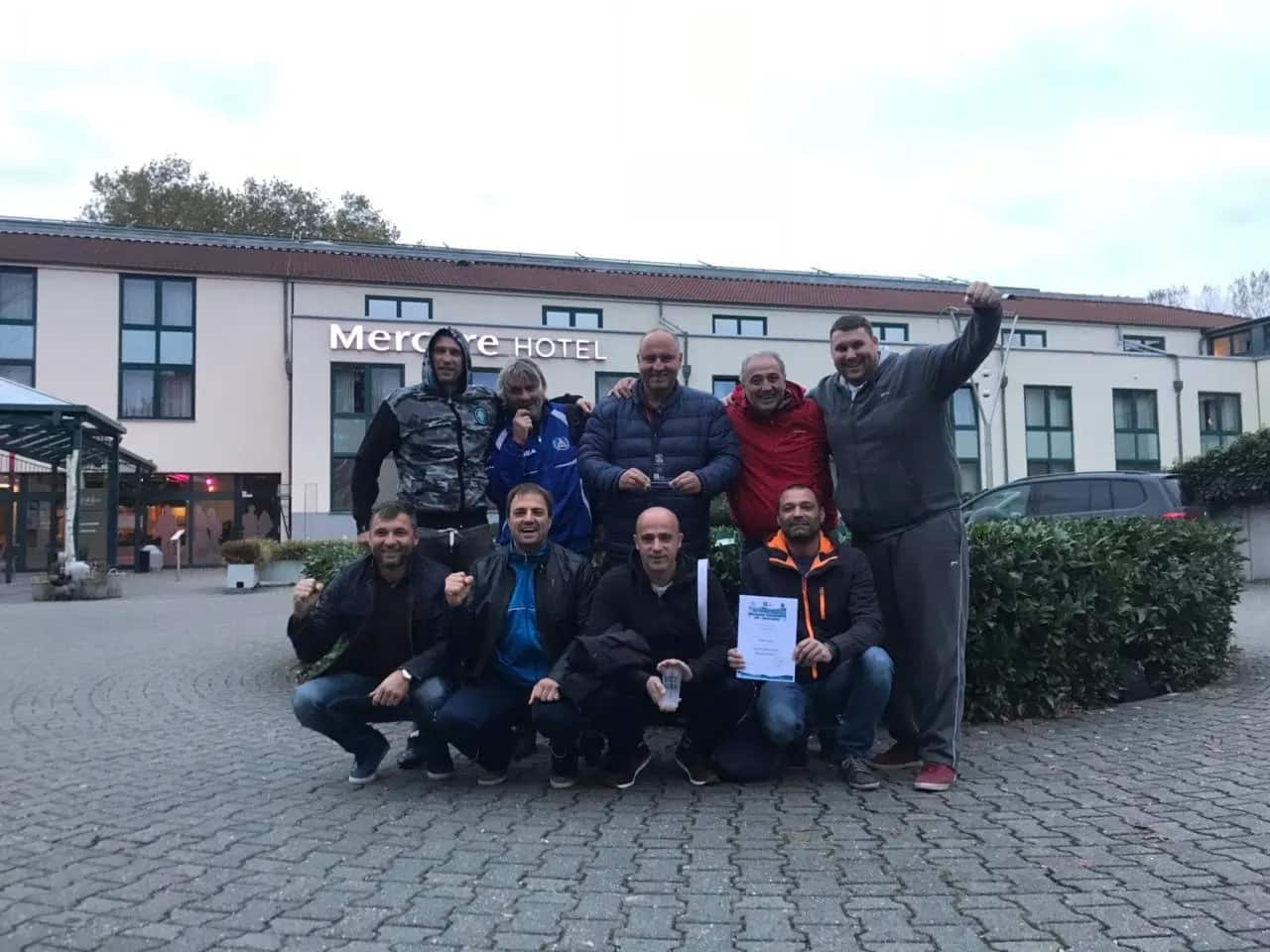 The team in front of the hotel with a certificate, Krefeld