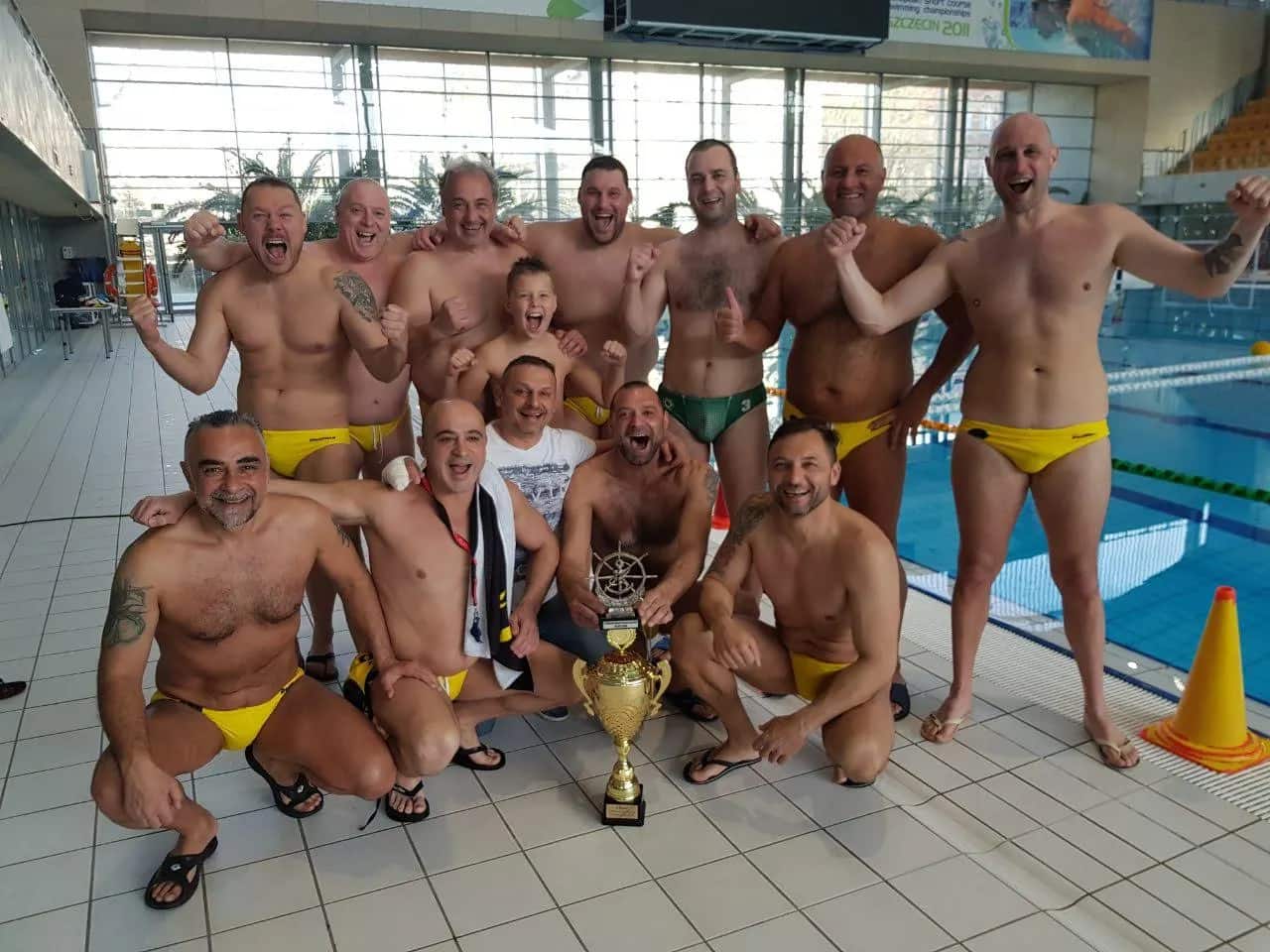The team with the trophy by the pool, Szczecin
